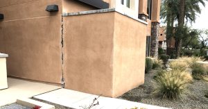 Wall cracked because of likely soil issues.